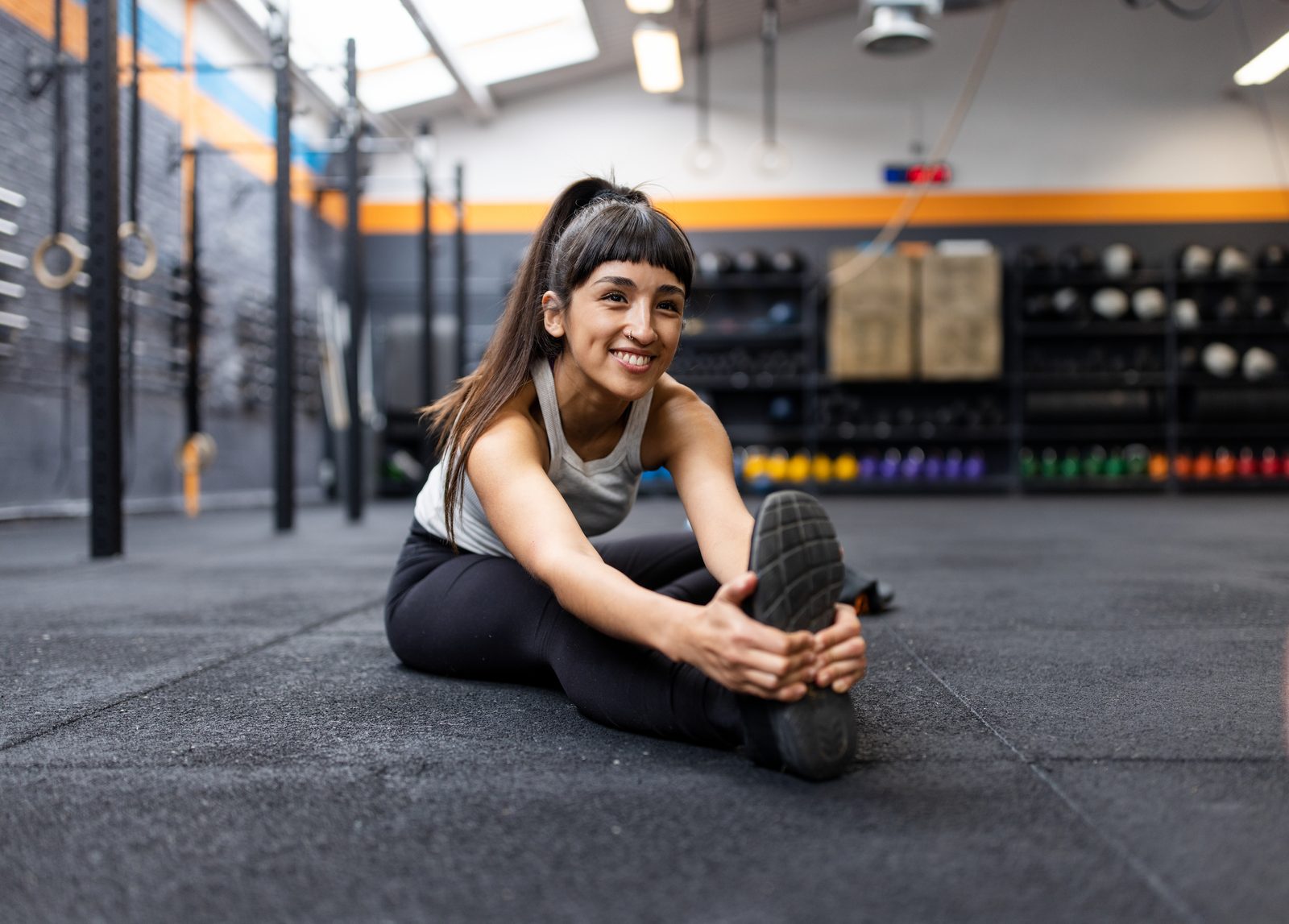 A person stretching before a training session